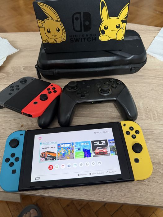 Vand nitendo switch 2 stare buna cu accesorii