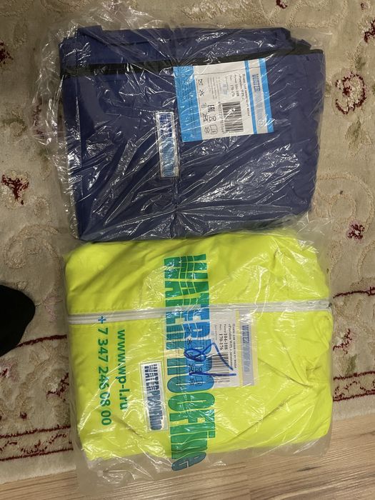 Дождевики новые.