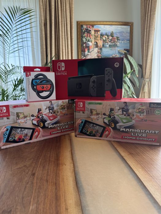 Nintendo switch конзола + волан+ количките на Марио и Уйджи
