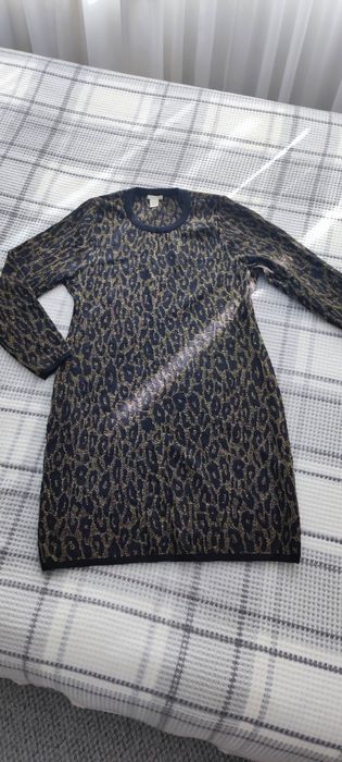 Vând rochie stil casual animal print