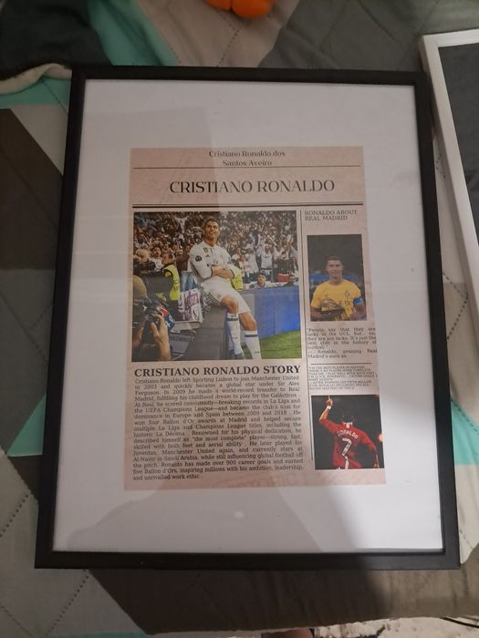 Постери на Роналдо и Меси