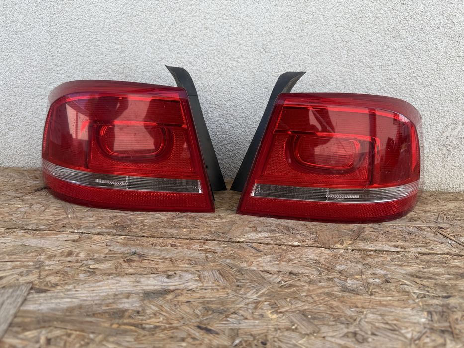 Set stop tripla lampa stanga dreapta aripa caroserie VW Passat B7 seda