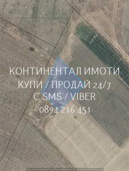 код 63103. Имот 630м2  на 100 метра от последните къщи, до ток и вода