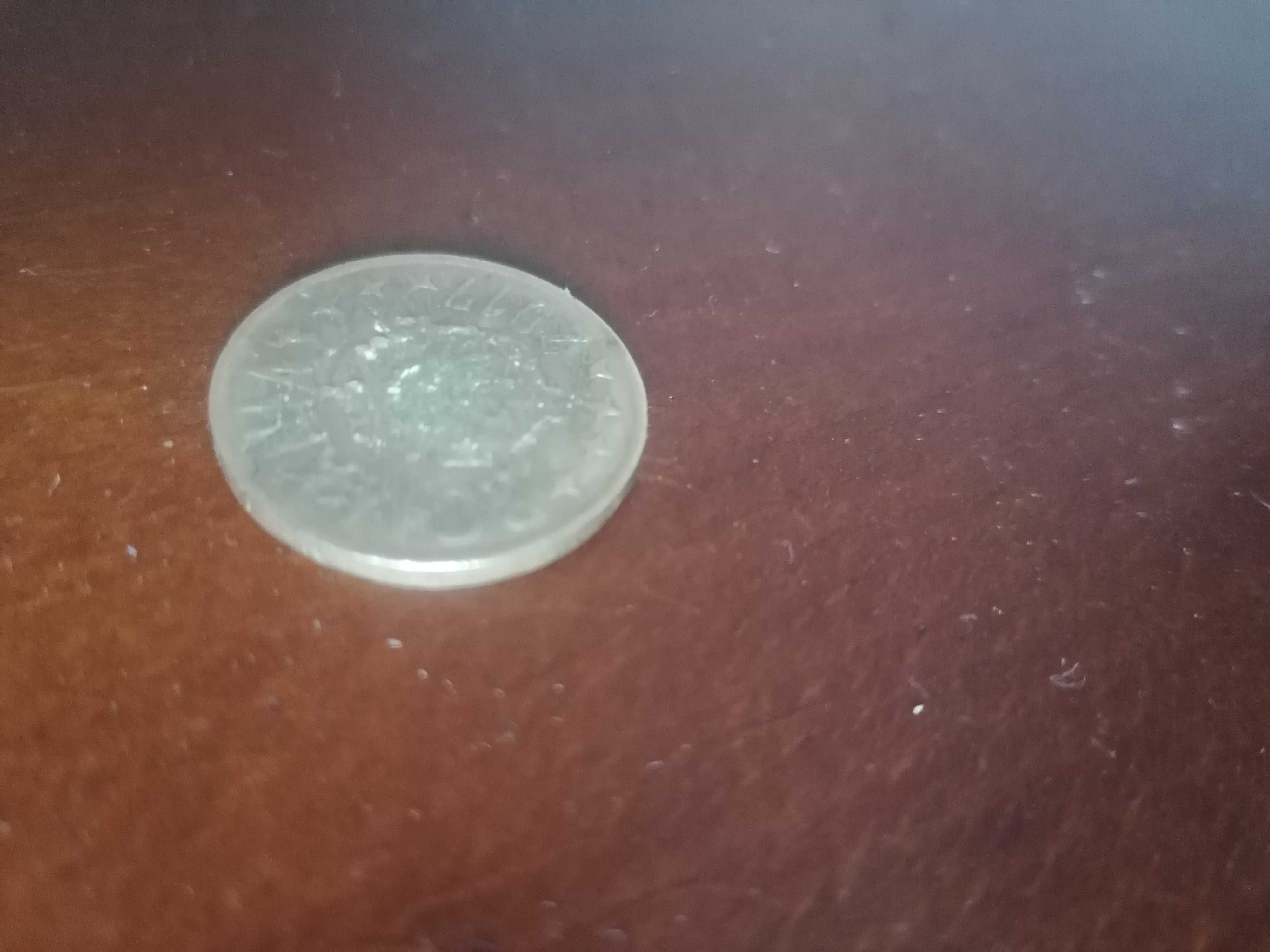 Modeda de 50 de bani cu eroare de fabricare fiarte rara