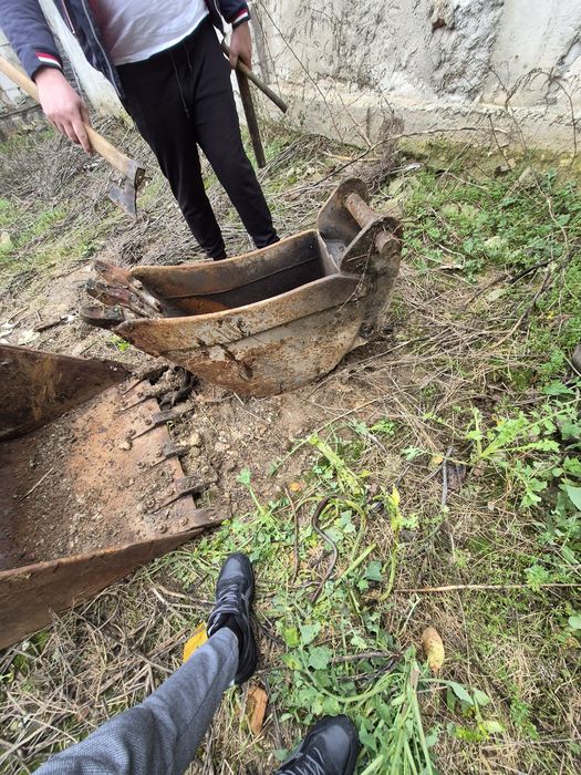 Cupe buldoexcavator caterpilar