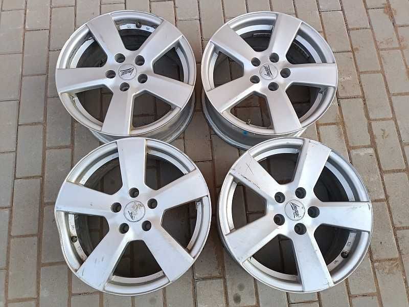 Продам оригинальные легкосплавные диски на автомашину Ford.