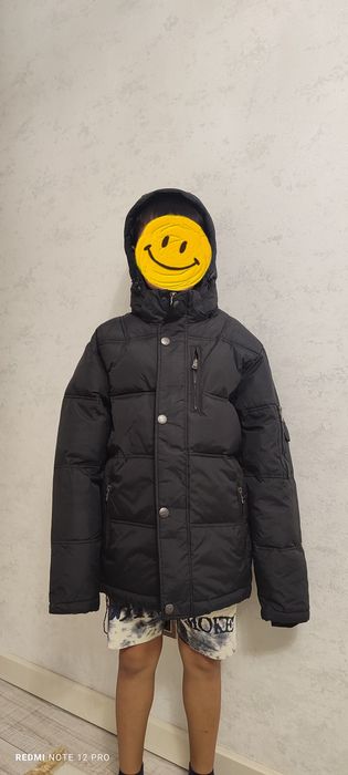Куртка зимняя на мальчика,новая Россия 25000тг.
