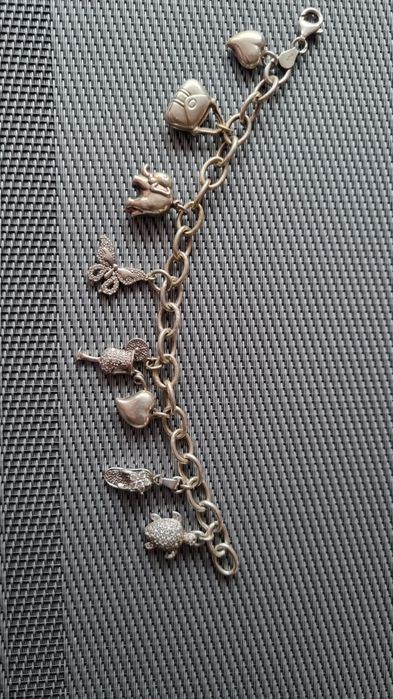 Сребърна гривна с сребърни талисмани