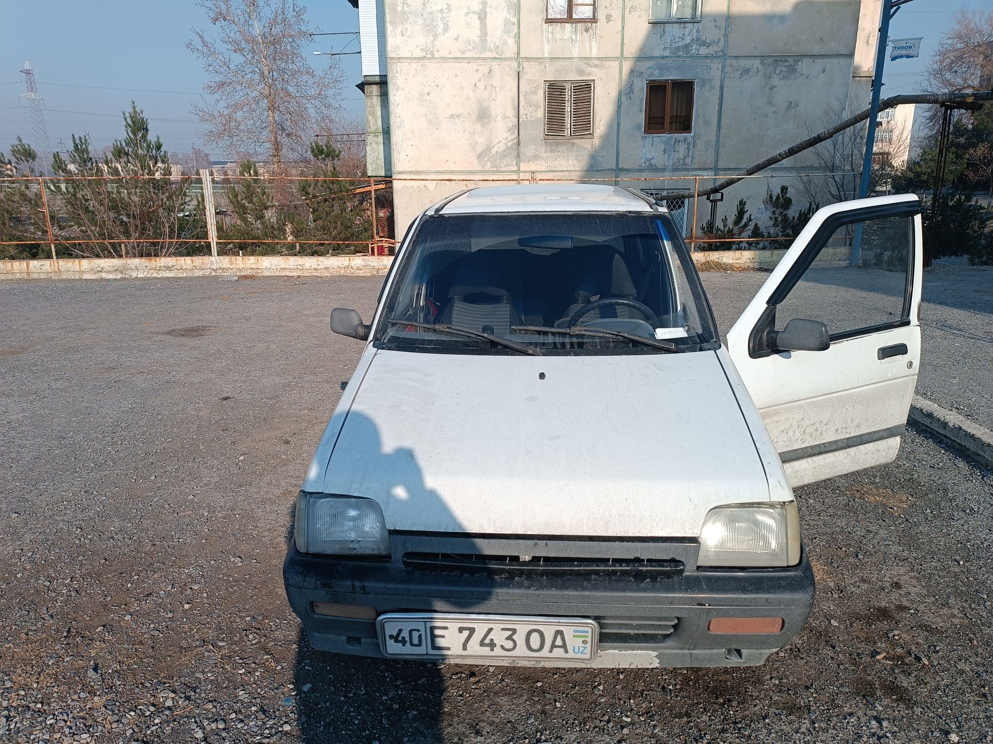 Toco 1998yil rangi oq, benzin