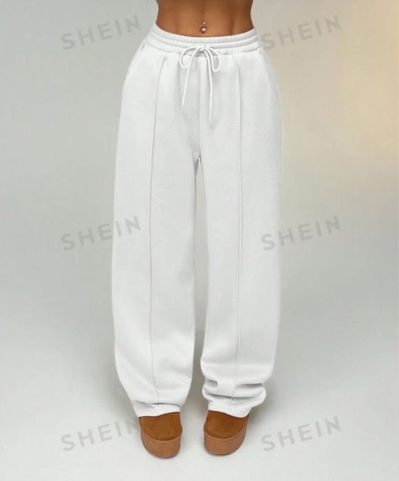 Pantaloni evazati albi