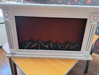 Vand o decoratiune electrica  tip semineu