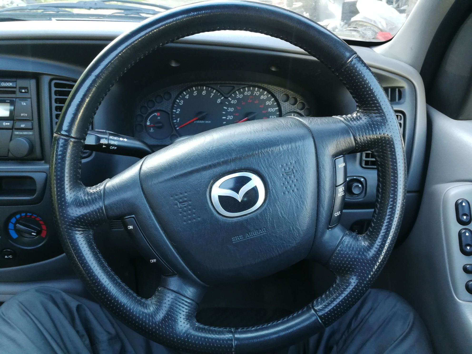 на части Mazda Tribute 2.0