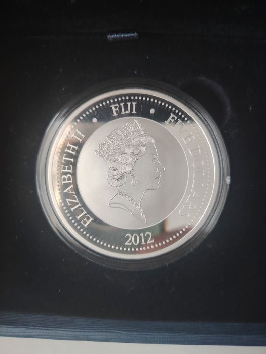 Инвестиционни монети сребърна монета с частично позлатяване 24 карата