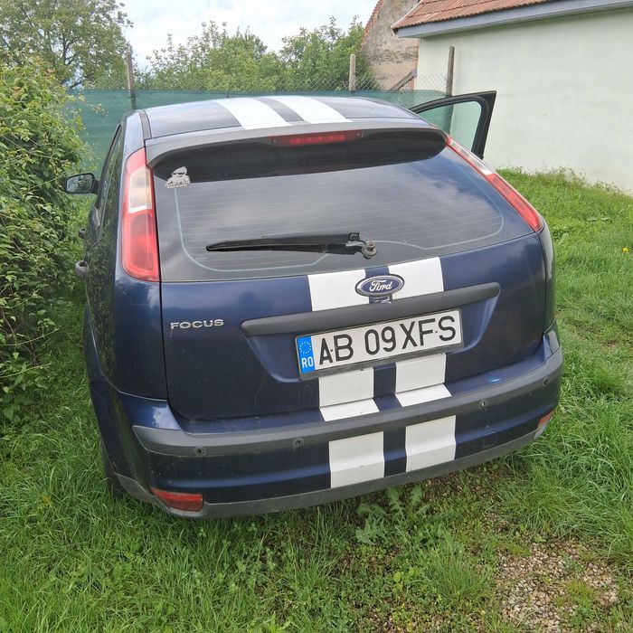 Mașină Ford Focus+ BMW 318 volan dreapta