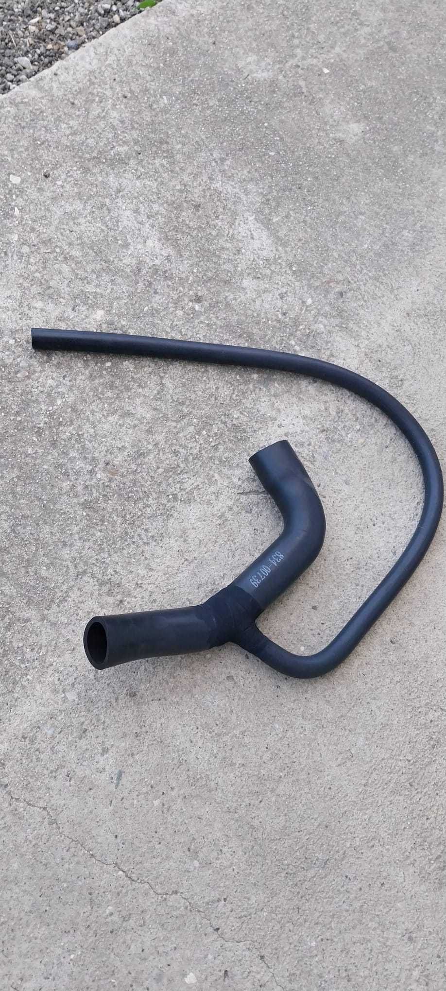 Vand furtun racire buldoexcavator si stergator geam spate.