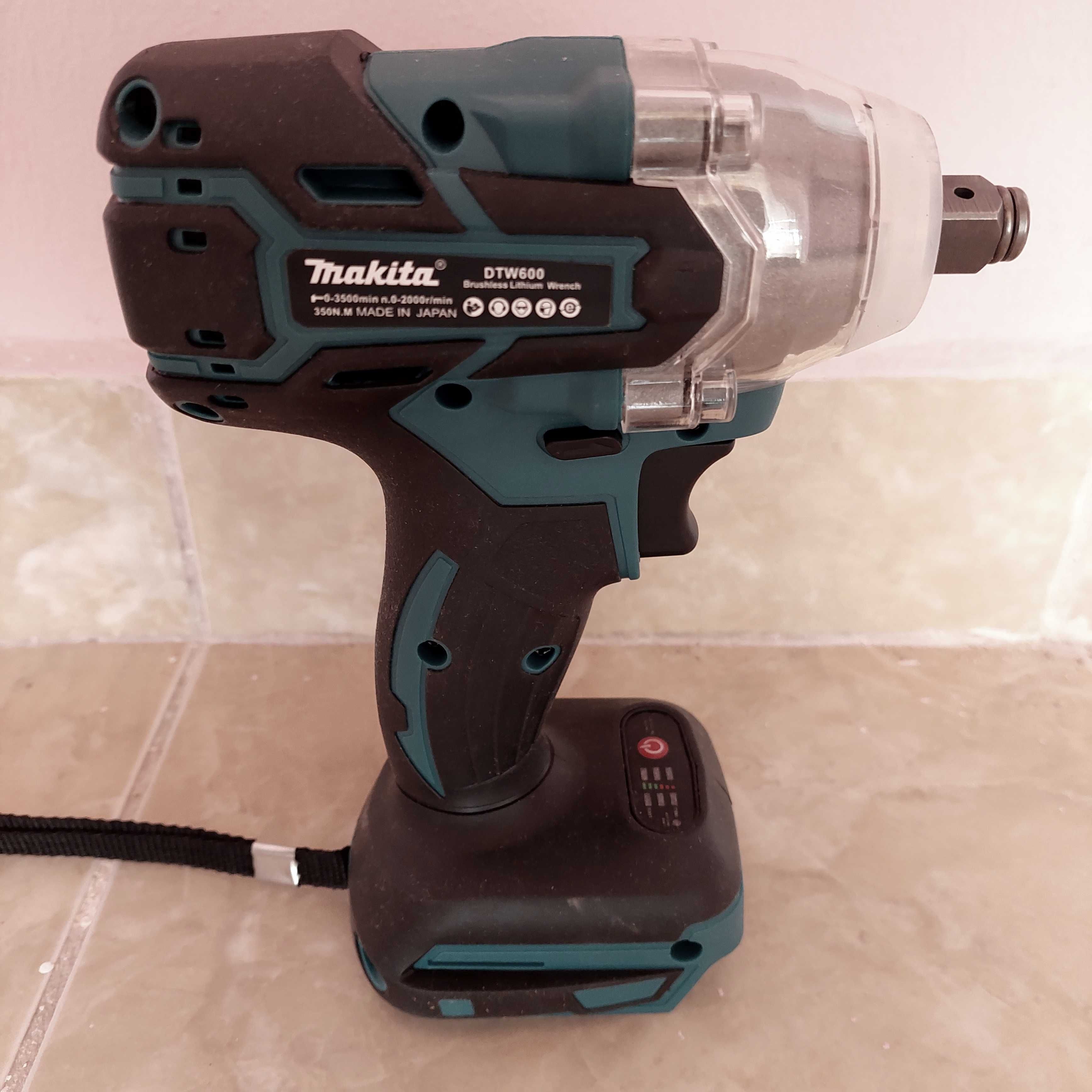 Bormașina  cu impact MAKITA DTW 600 si flex MAKITA DGA 404