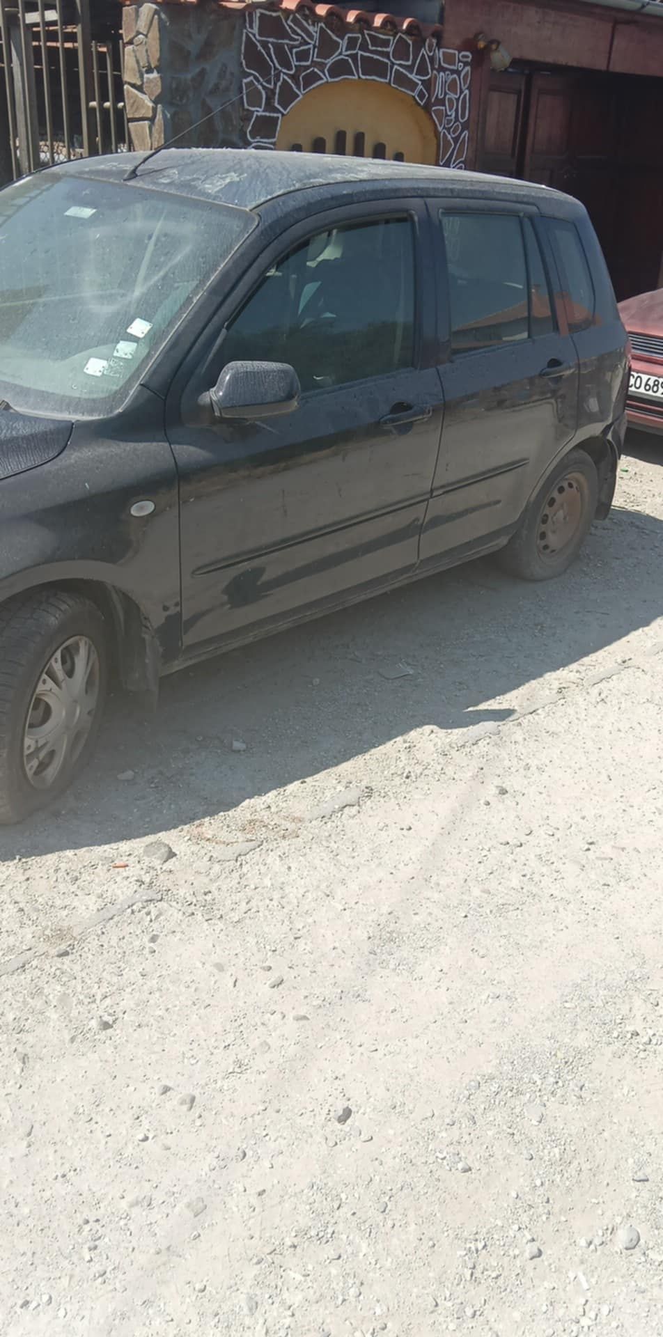 Mazda 2 на части