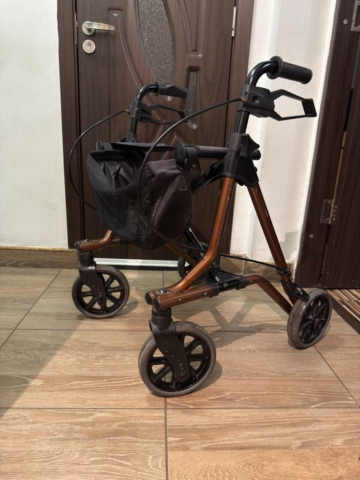 Premergator pliabil cu cadru reglabil pe inaltime ca nou