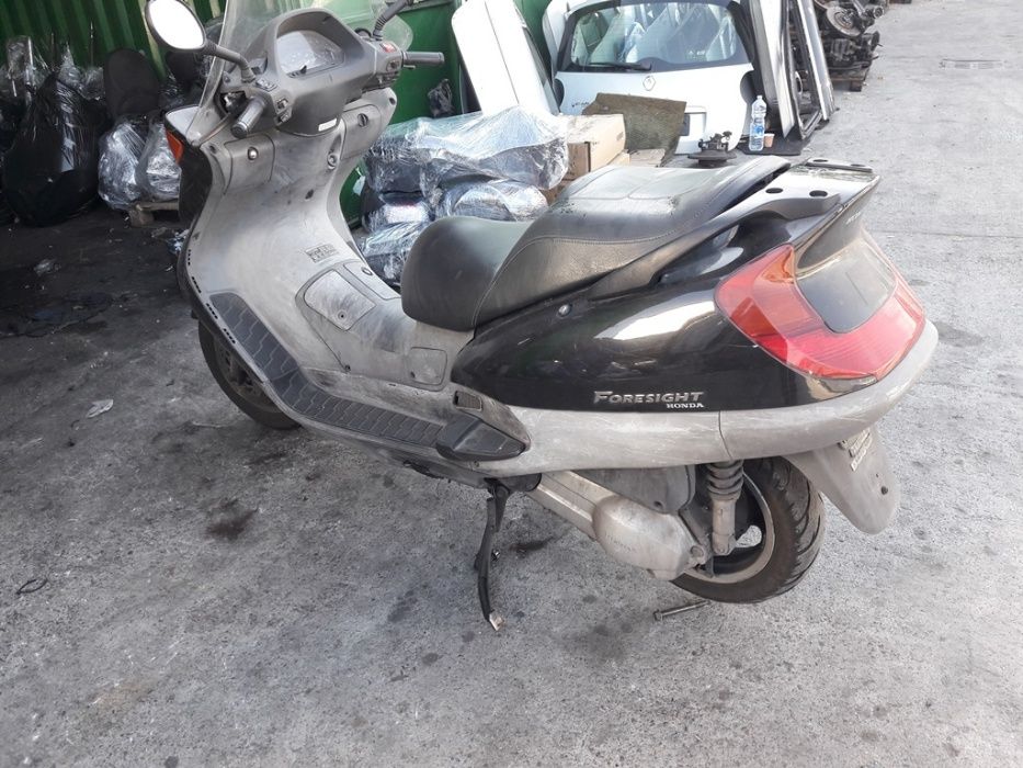 Скутер(мотоциклет)Хонда Форсайт 250Honda Foresight 250() -на части