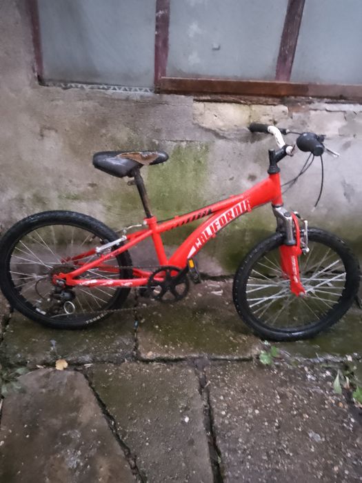 Bicicleta copii 8-14 ani