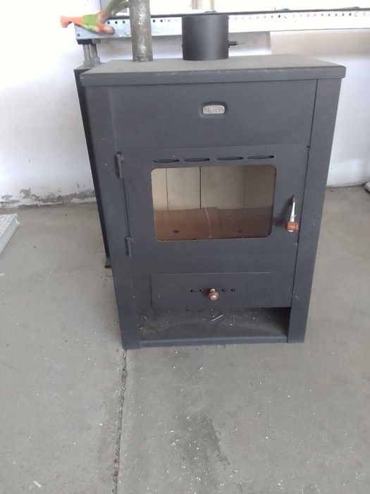 Камина за отопление с дърва