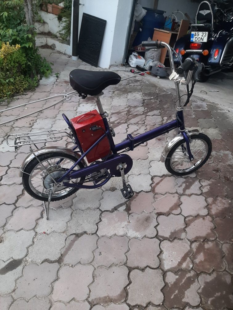 Bicicleta pliabila  roti pe 16 cu motor electric.