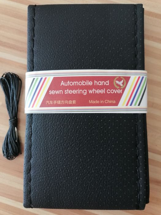 Nuca schimbator Dacia, Husa piele volan