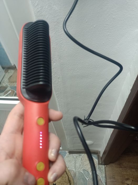 Perie de par uscat îndreptat