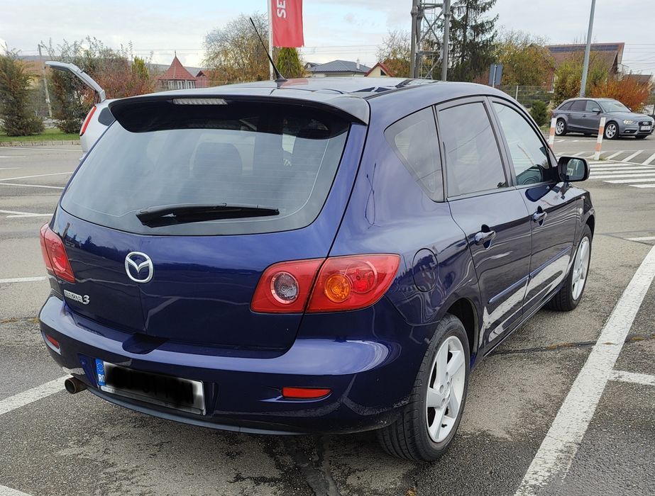 Mazda 3 1.6 benzina 2005 folie geamuri doua seturi de anvelope