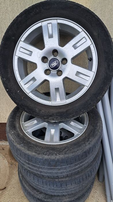 Roti Ford 205/55/16 aliaj,cauciucurile sunt uzate