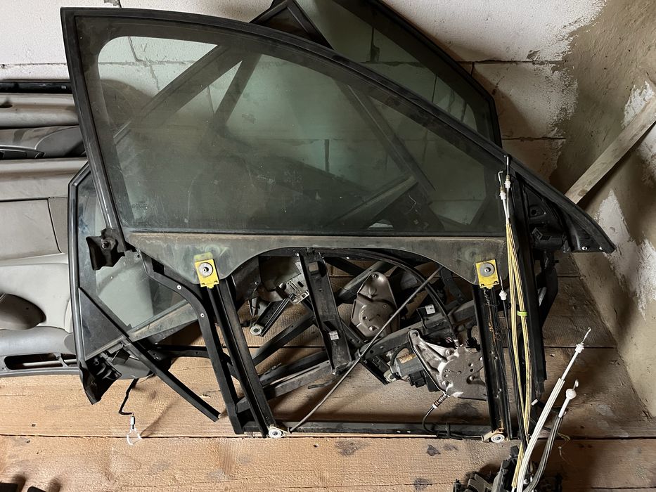 Elemente portieră Audi A6 C5(Geam, macarale, antifonari, fete de usa)