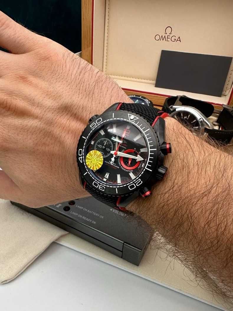 omega seamaster planetocean deep black / red
