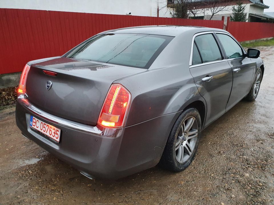 Dezmembrez Lancia THEMA Chrysler 300C 2011 motor 3.0d 239cp cod EXF euro 5 usa portiera stanga dreapta fata spate bara macara geam turbina injector aripa oglinda dezmembrari piese caseta de directie