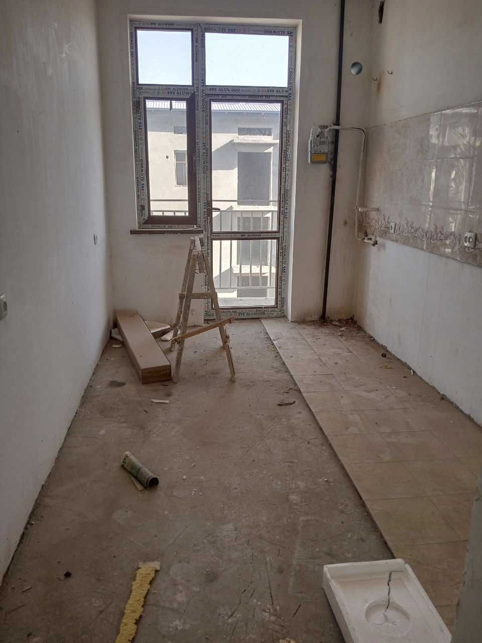 Ko`p qavatli uydagi xonadon