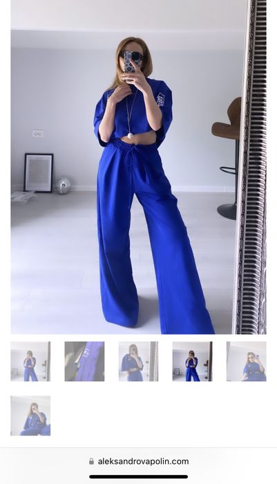 Дамски тъмно син панталон със широки крачоли.