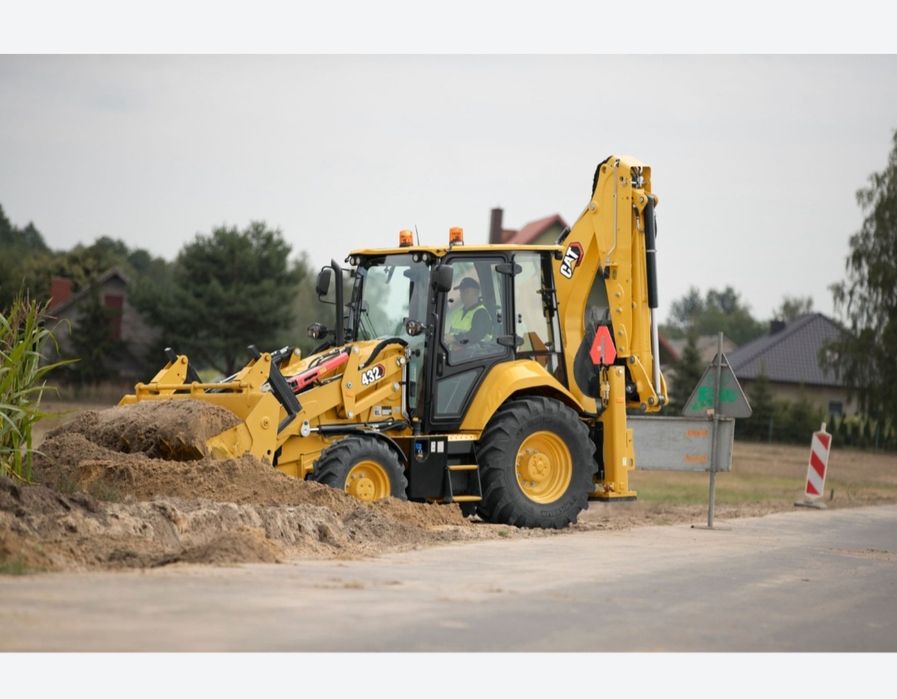 Услуги экскаватора-погрузчика