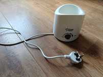 Уред за затопляне на кърма  Tommee tippee