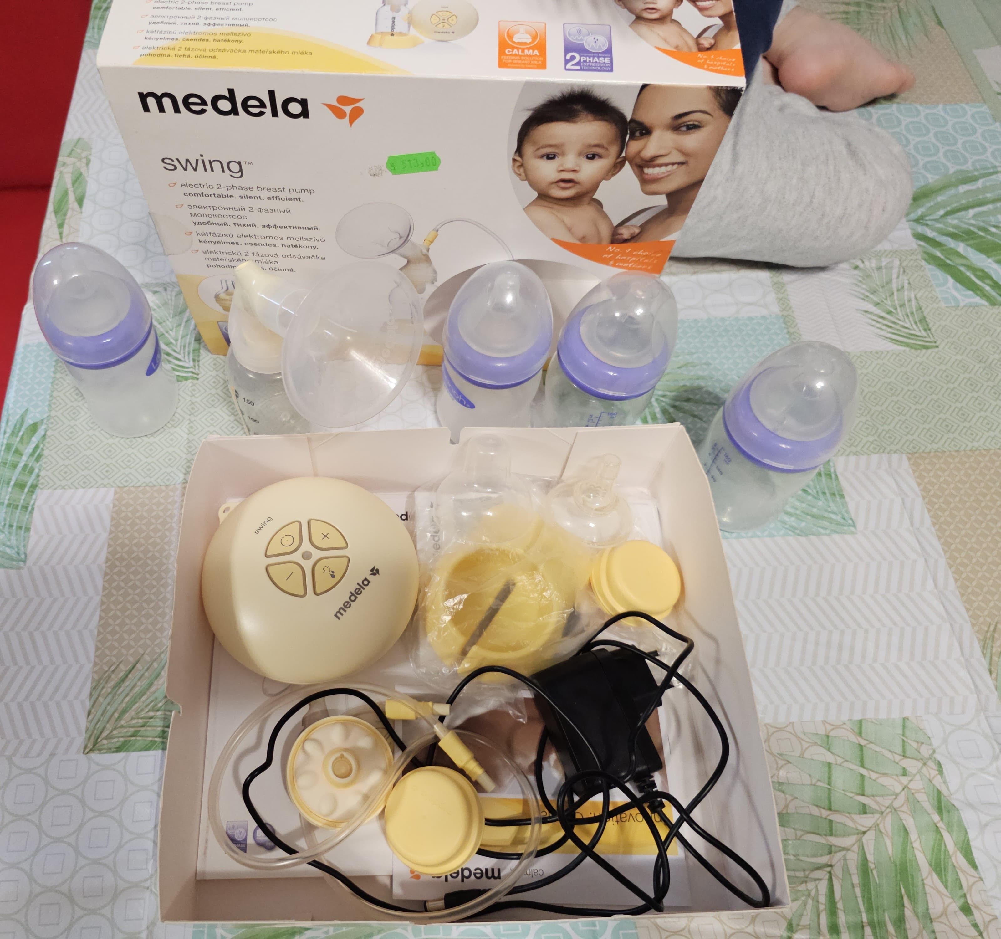 Pompa electrica Medela Swing ( bonus 4 biberoane Lasinooh 160 ml )