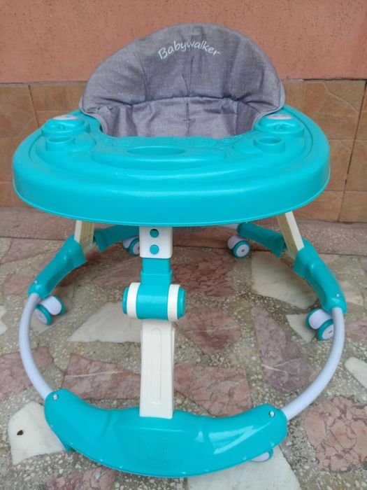 Premergător copii , reglabil pe înălțime , folosit foarte puțin