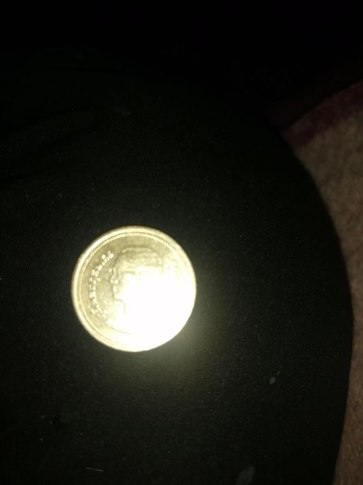 Продам монету кажетца доллар не дорого продам