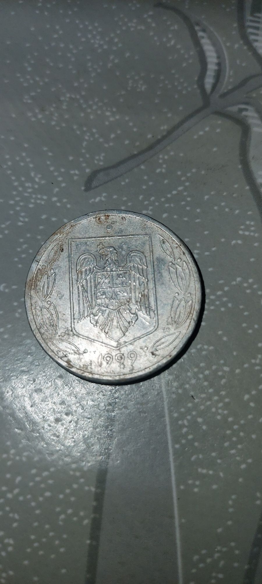 Vand monedă de 500 de lei 1999