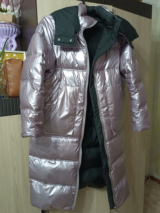 Продам женский пуховик.
