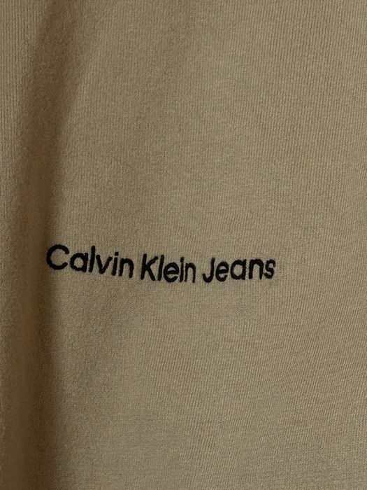 Пуловери Calvin Klein M,XS