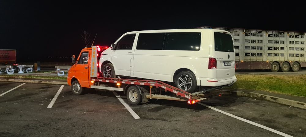 Tractari auto platforma transport utilaje trailer slep recovery