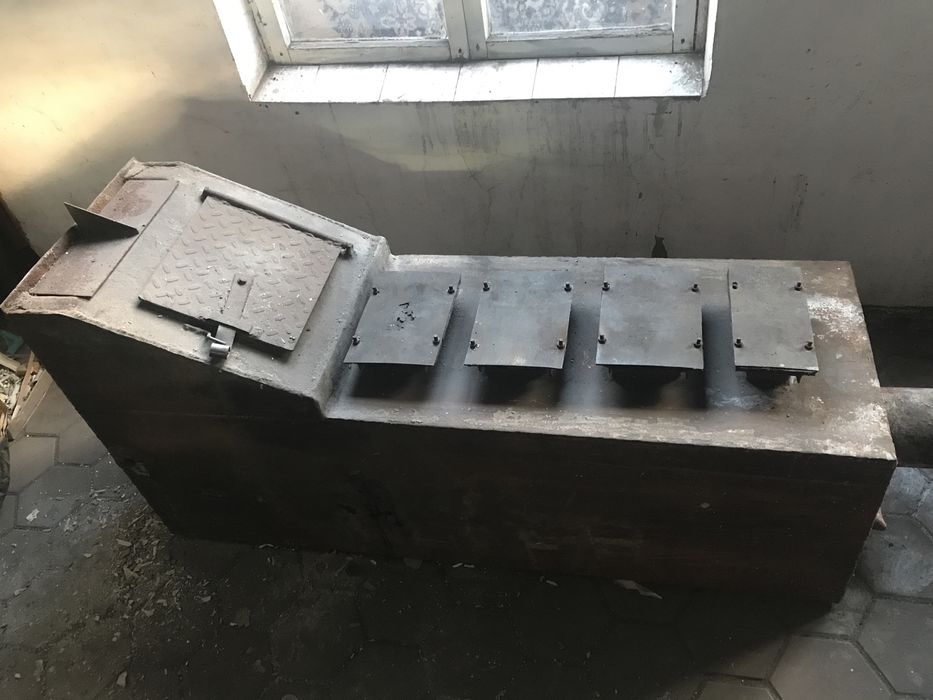 Котел отопления на твердом топливе