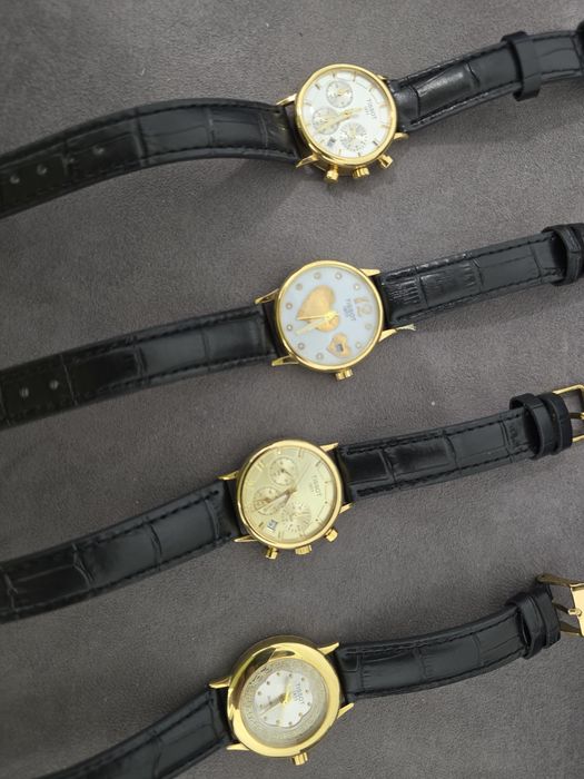 Женские золотые часы Tissot 750 пробы.