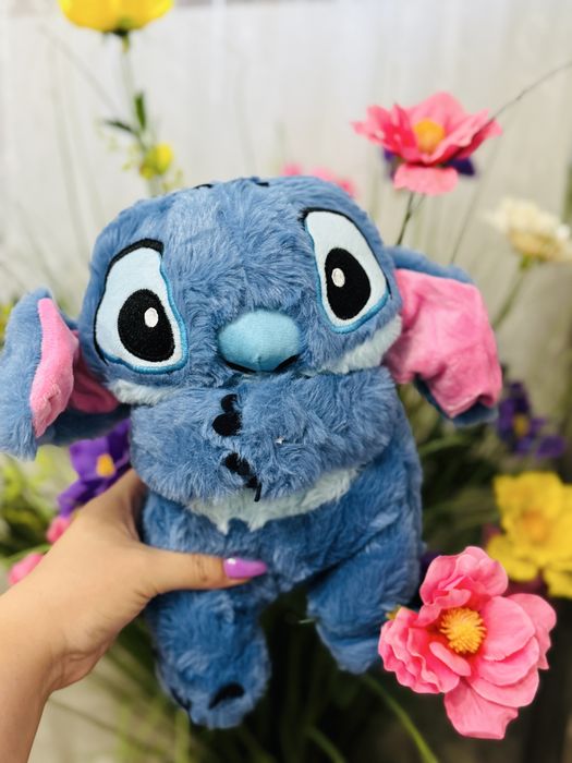 Ursulet plus stitch canta si respira