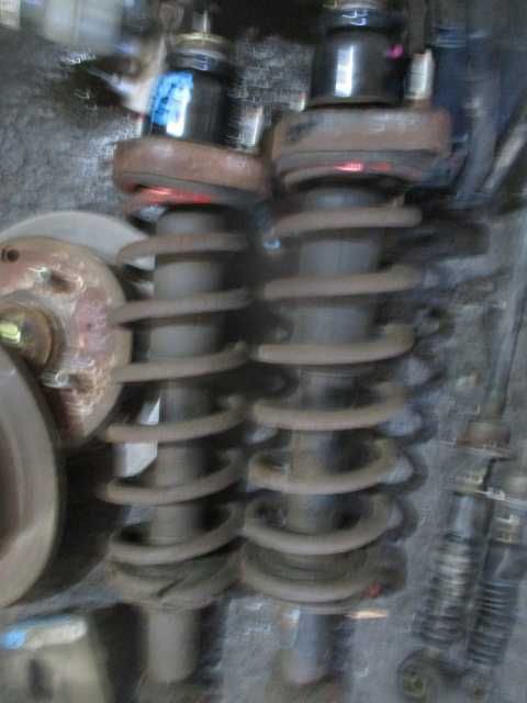 Amortizoare arcuri flanse spate MITSUBISHI LANCER an 2006 originale