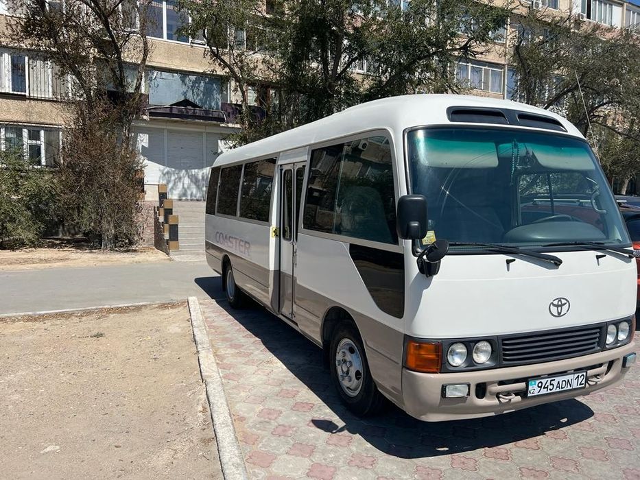 Автобус Toyota Coaster услуги перевозки пасажиров