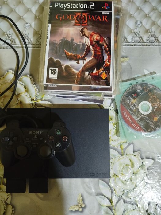 Продается ps2 с 50+ играми